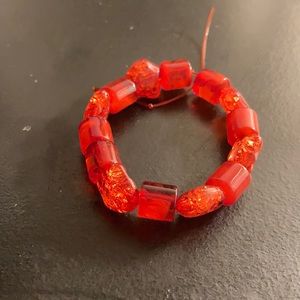 Nae’s red bracelet